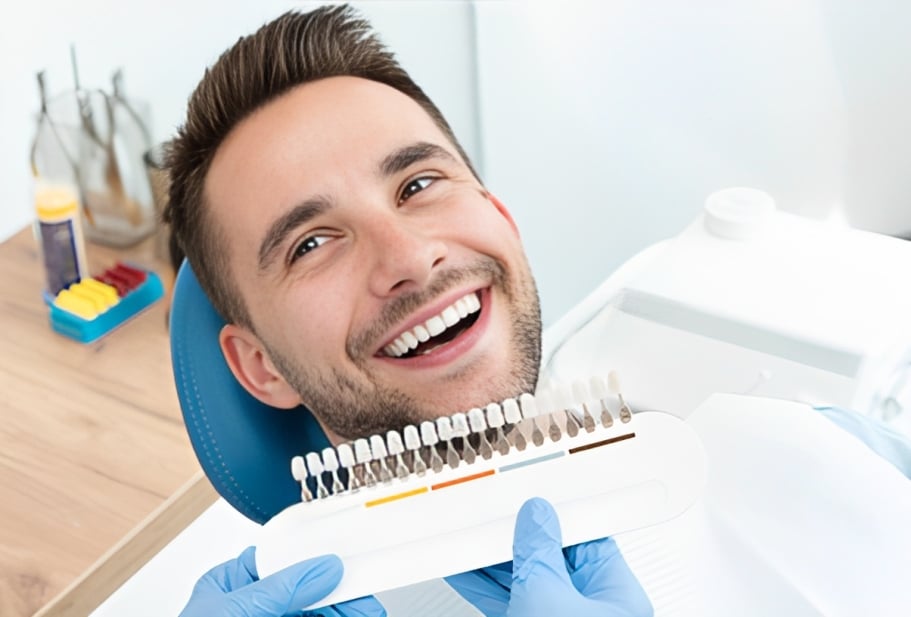 Smiling man in dental chair during checkup at Smile Santa Fe Dentistry office